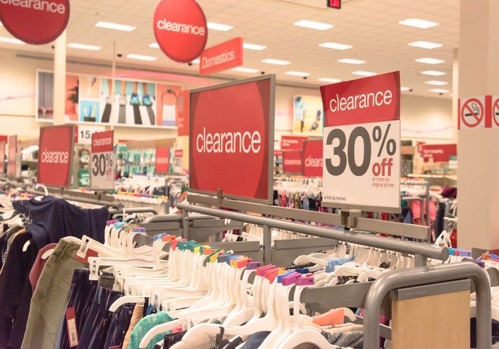 Brand promoter engaging shoppers during a product sampling event